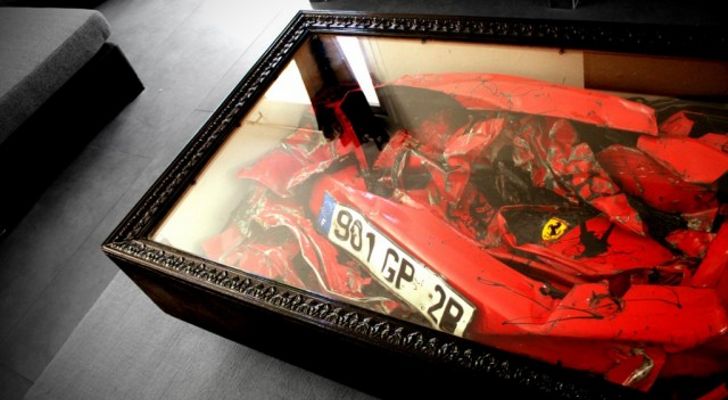 http://i1-news.softpedia-static.com/images/news-700/Crushed-Ferrari-Is-Now-Amazing-Coffee-Table.jpg