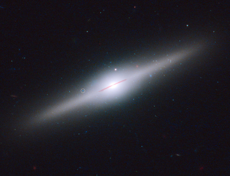 This spectacular edge-on galaxy, called ESO 243-49, is home to an 