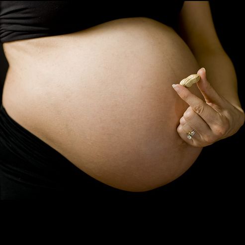 pregnant women eating. Image comment: Pregnant women
