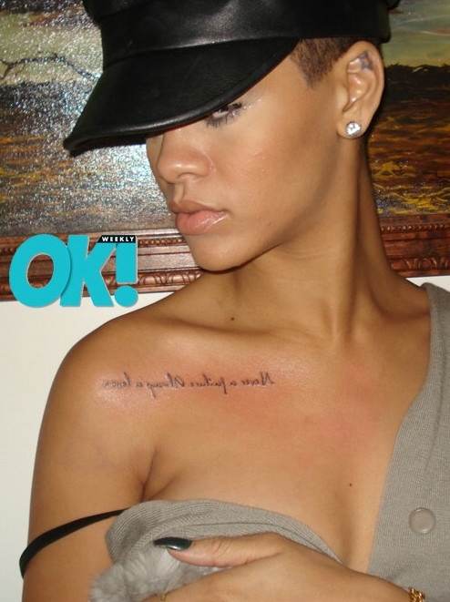 Rihanna Shows Off New Chest Tattoo