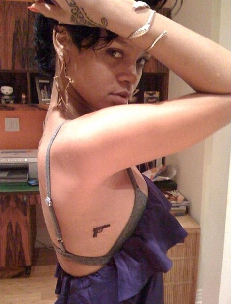 Tattoo Artist Unveils New Gun Tattoo on Rihanna's Ribcage