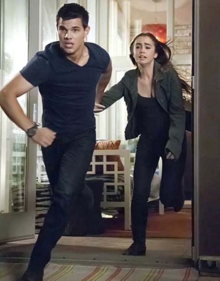 taylor lautner and lily collins. Image comment: Taylor Lautner